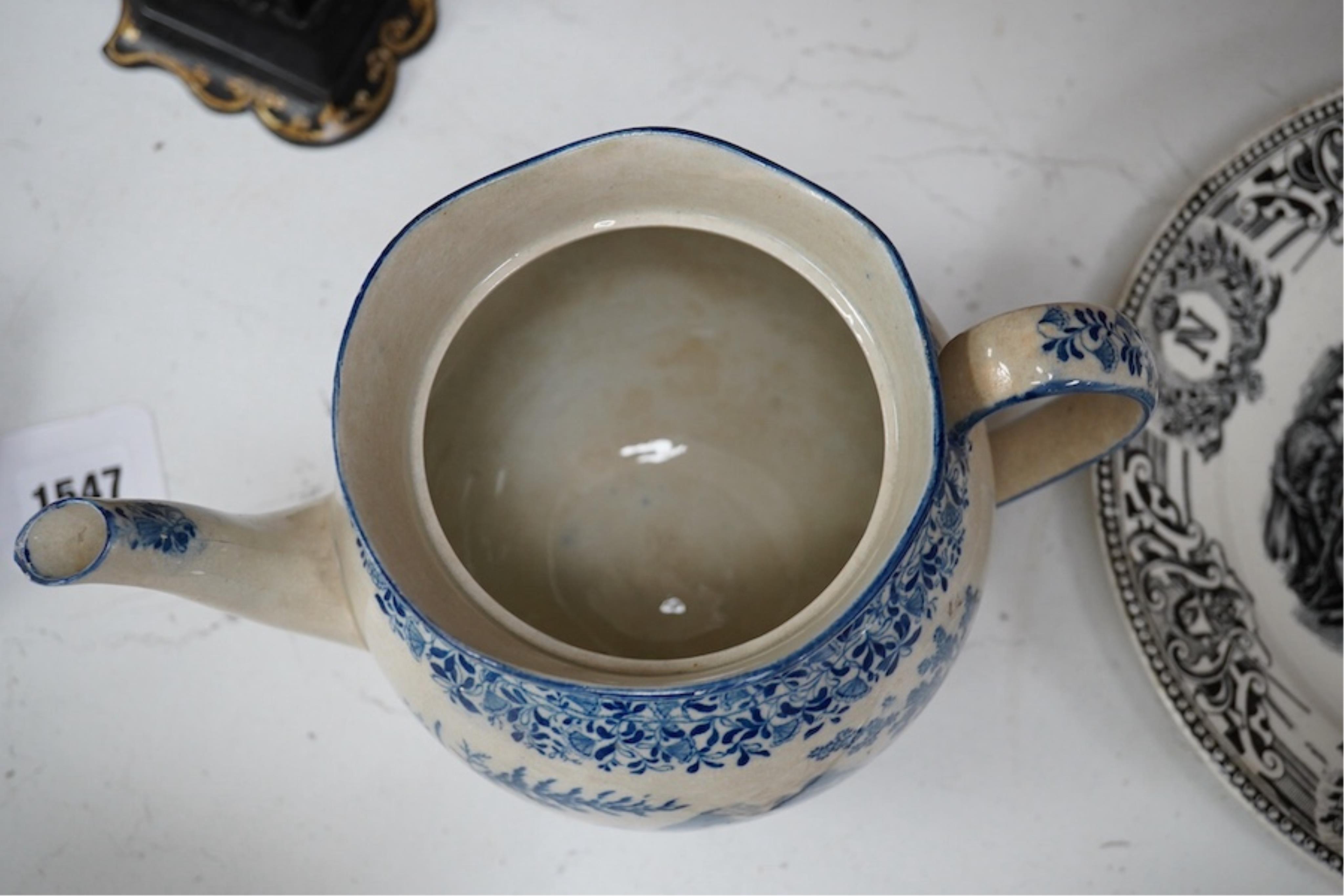 A mid 19th century pearlware teapot, a moustache mug and cover, two chinoiserie tiles and a Napoleon black and white transfer dish, Madrid 1808. Teapot and cover 16cm high. Condition - tile and teapot spout chipped